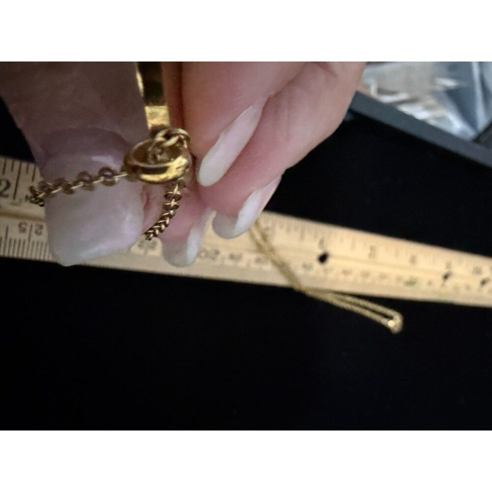 Channel symbol over mother of pearl inlay pendant on gold toned chain - Picture 6 of 10